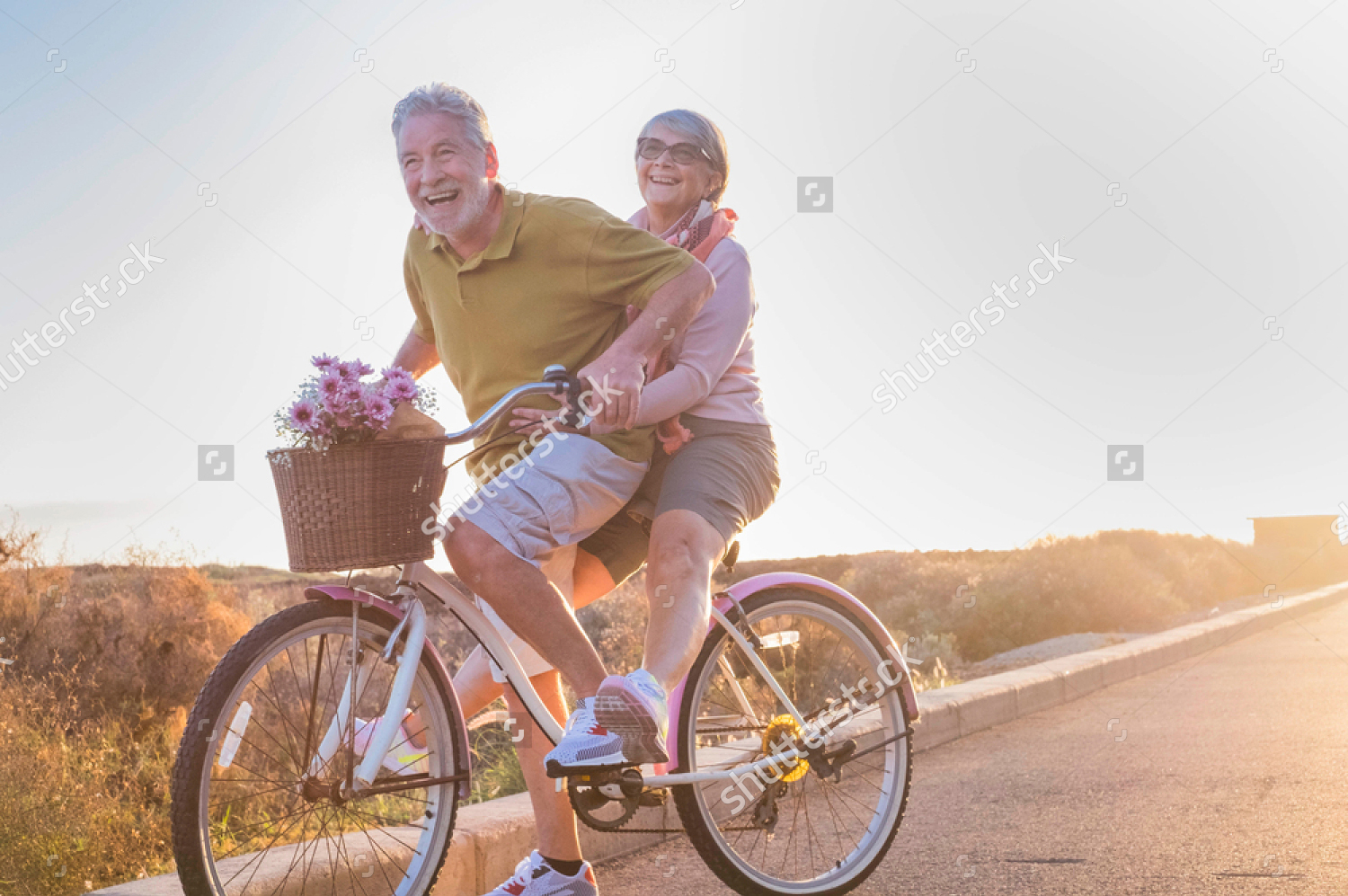 Couple hugging among moving boxes
